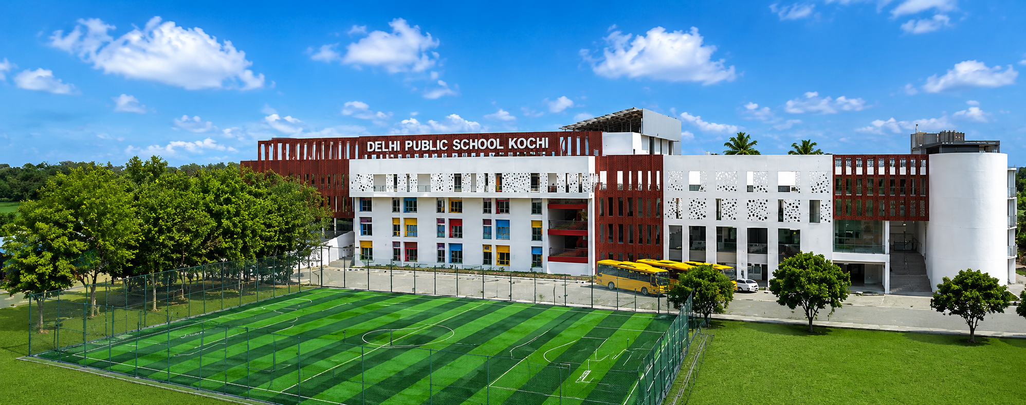 DPS International School Kochi campus with modern school building and playground